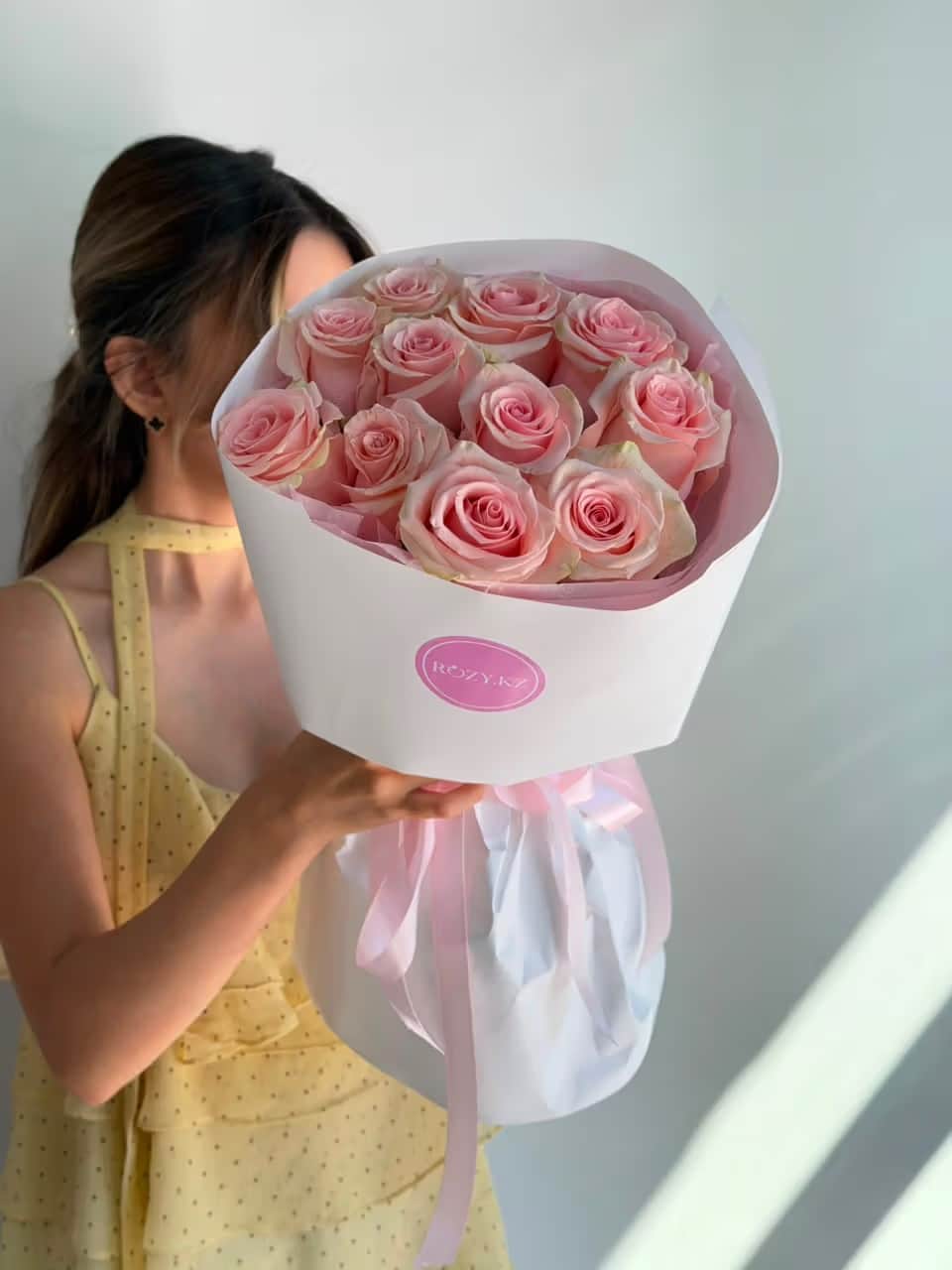 11 light pink roses