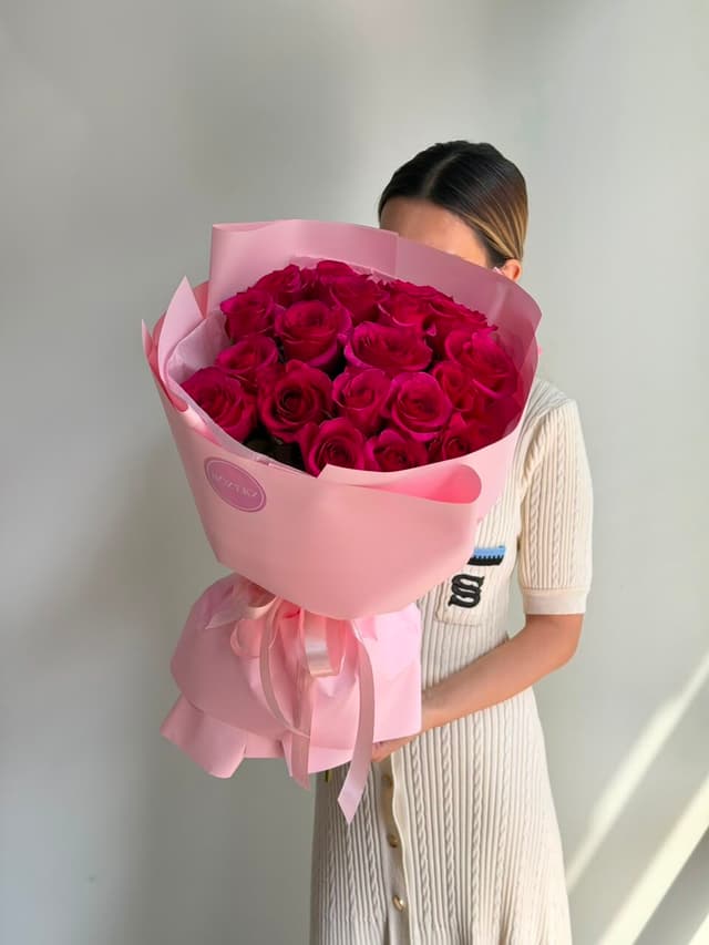 21 bright pink roses