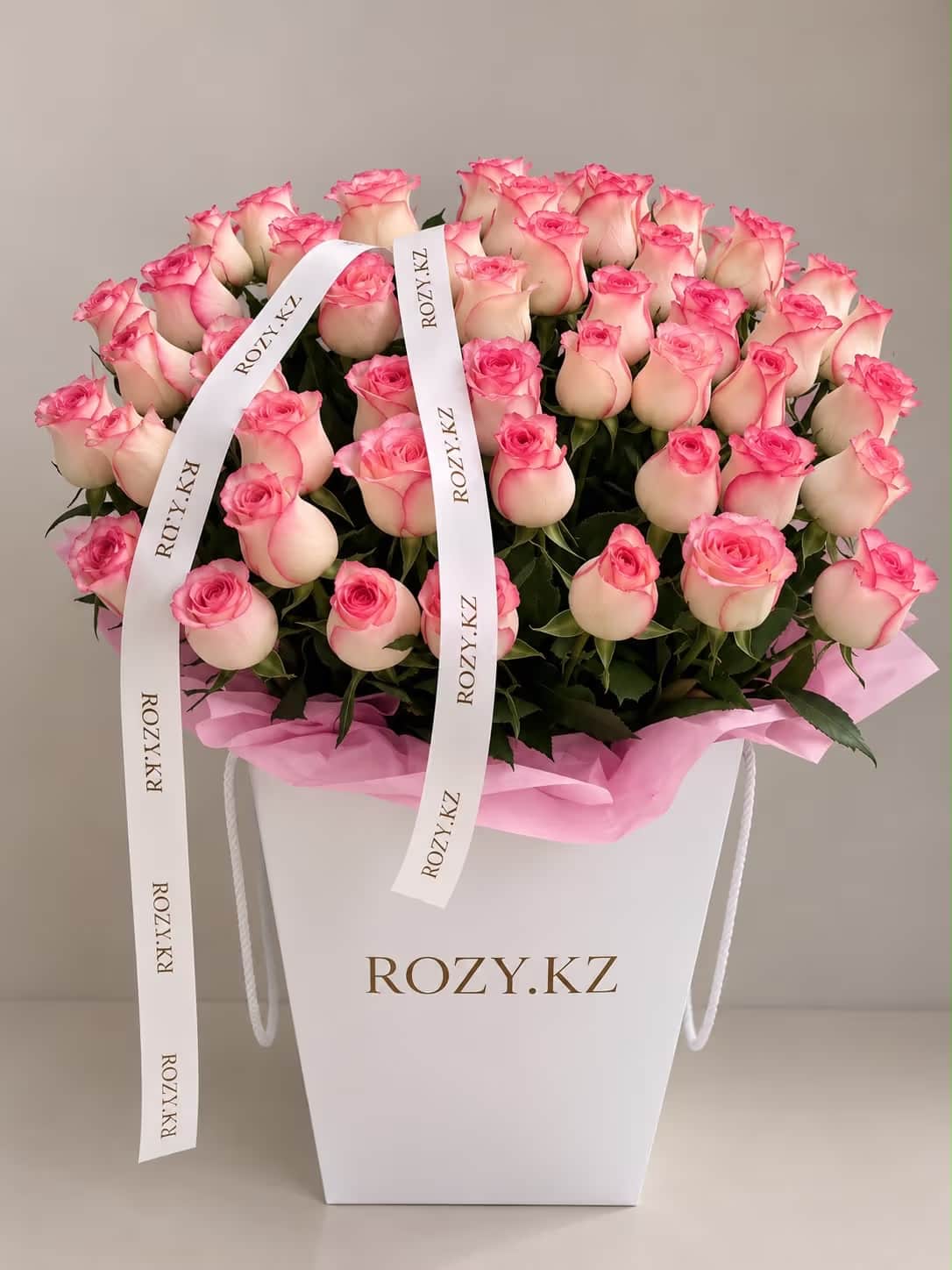 Arrangement of 51 roses in a carrier — Basket